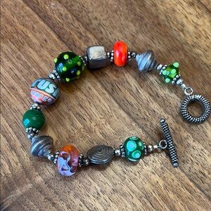 Colorful Orange Crush bottle cap and blown glass bead bracelet!